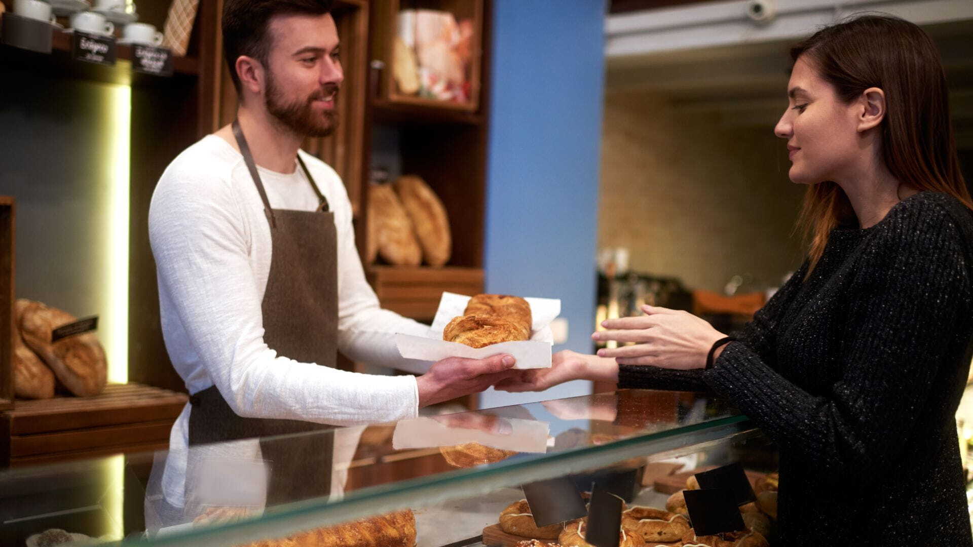 Retail staff delivering customer experience — WPN supports content marketing for service-focused businesses.
